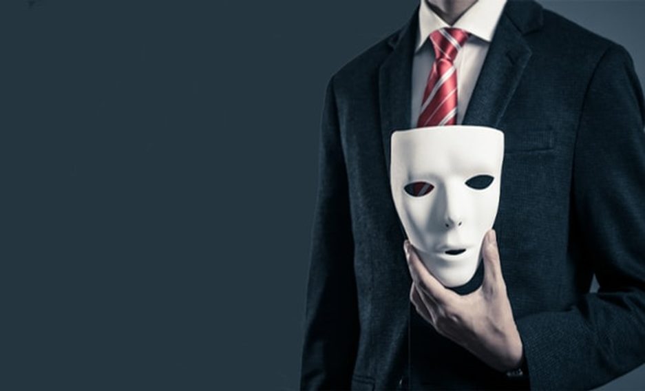 Man holding mask. Prevent Financial Fraud. Runey & Associates Wealth Management. Mount Pleasant, SC. 