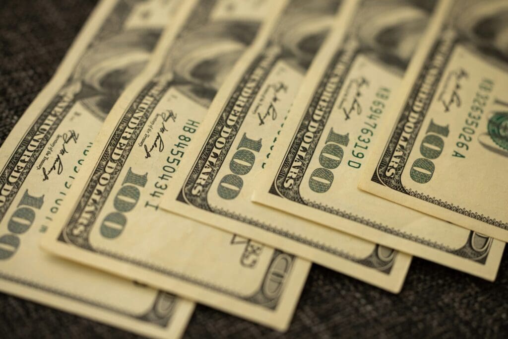 Picture of $100 bills used as metaphor for 5 Tax Saving Strategies for Business Owners by Runey & Associates Wealth Management. 