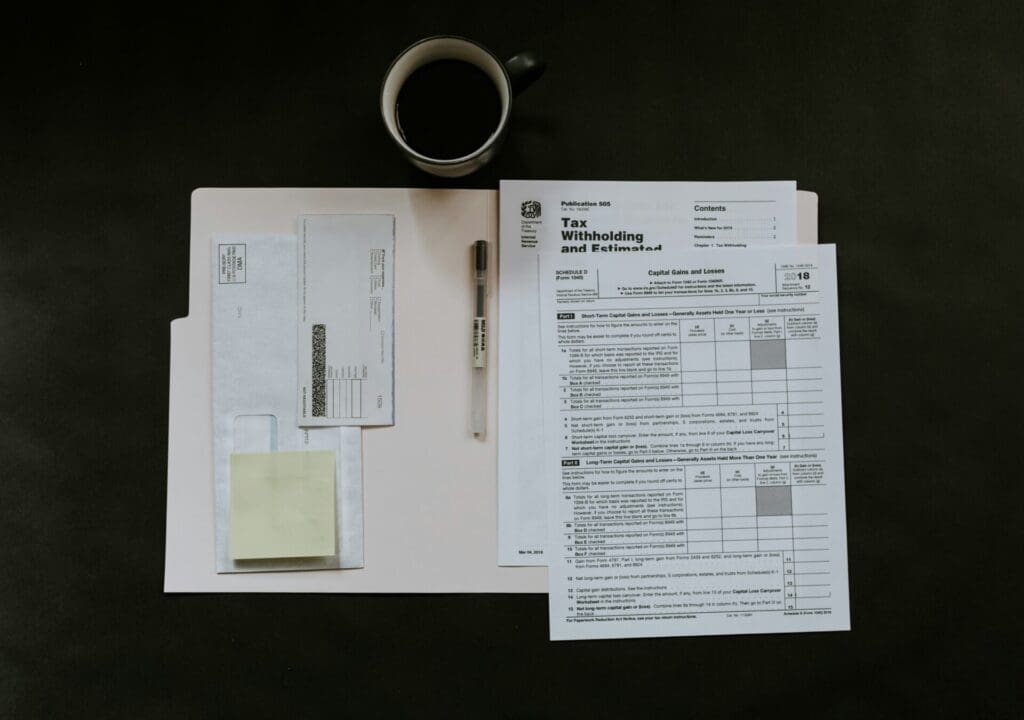Picture of IRS Tax Forms used as metaphor for 5 Tax Saving Strategies for Business Owners by Runey & Associates Wealth Management. 